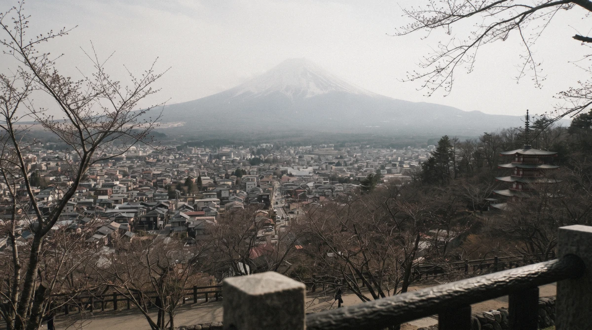 View from the Chureito Pagoda observation deck over Fujiyoshida town toward Mount Fuji, the classic composition covered in this chureito pagoda guide