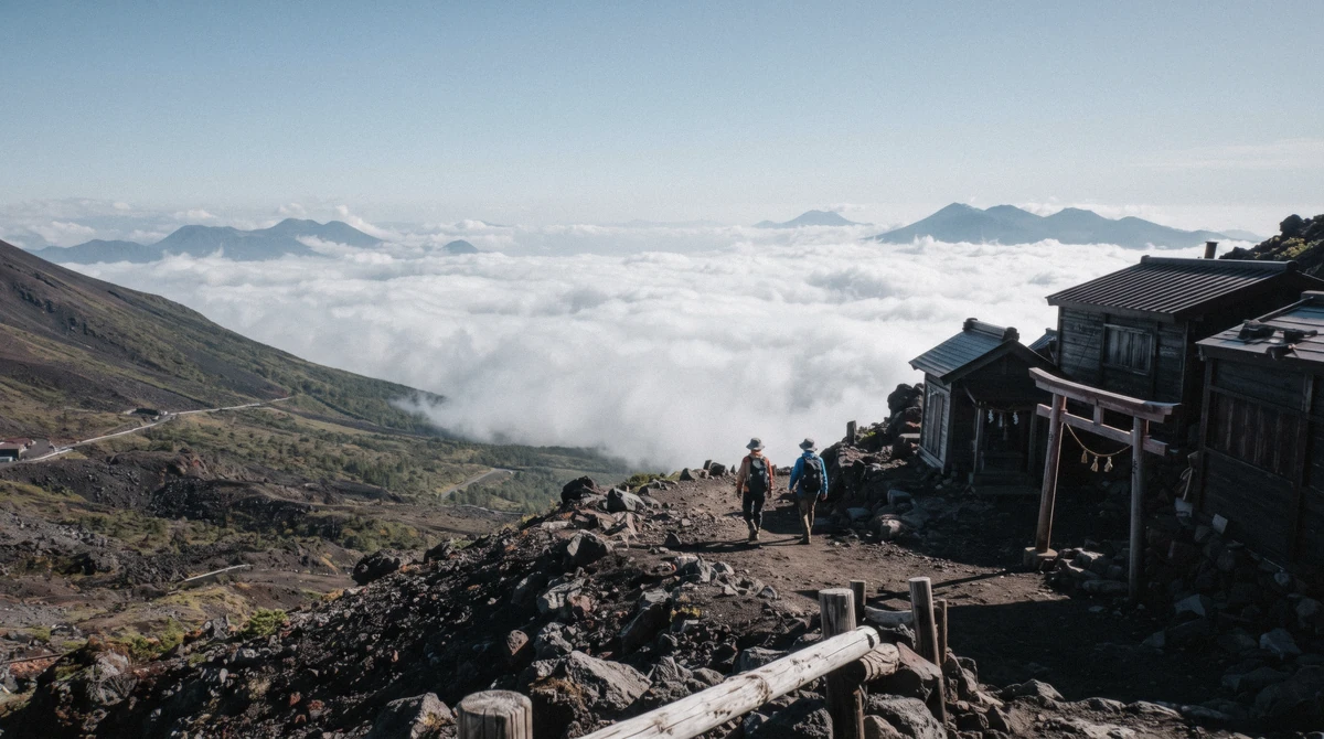 Above-the-clouds view of Mount Fuji's summit from the Subaru Line 5th Station at 2,300 metres on the mt fuji 5th station hot spring tour, Yamanashi, Japan